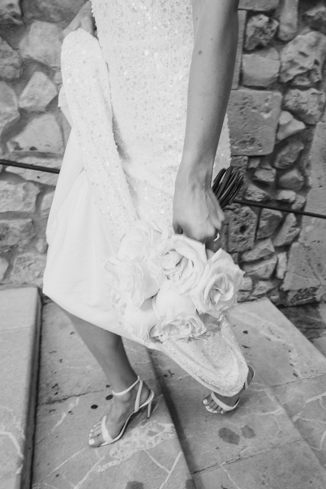 a bride walking up the steps