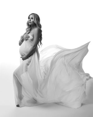 Timeless Black and White Studio Silhouette Fabric Maternity Photoshoot in San Diego, captured by Daryana Orange.