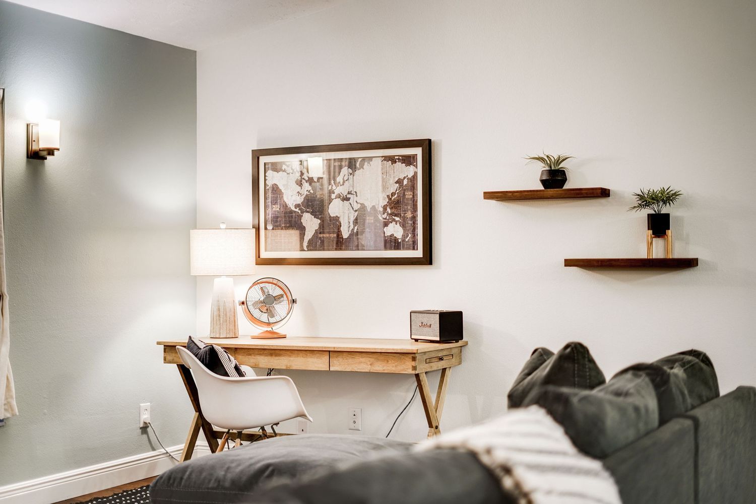 a professional real estate photo of a modern, well-decorated bedroom in a home in florida