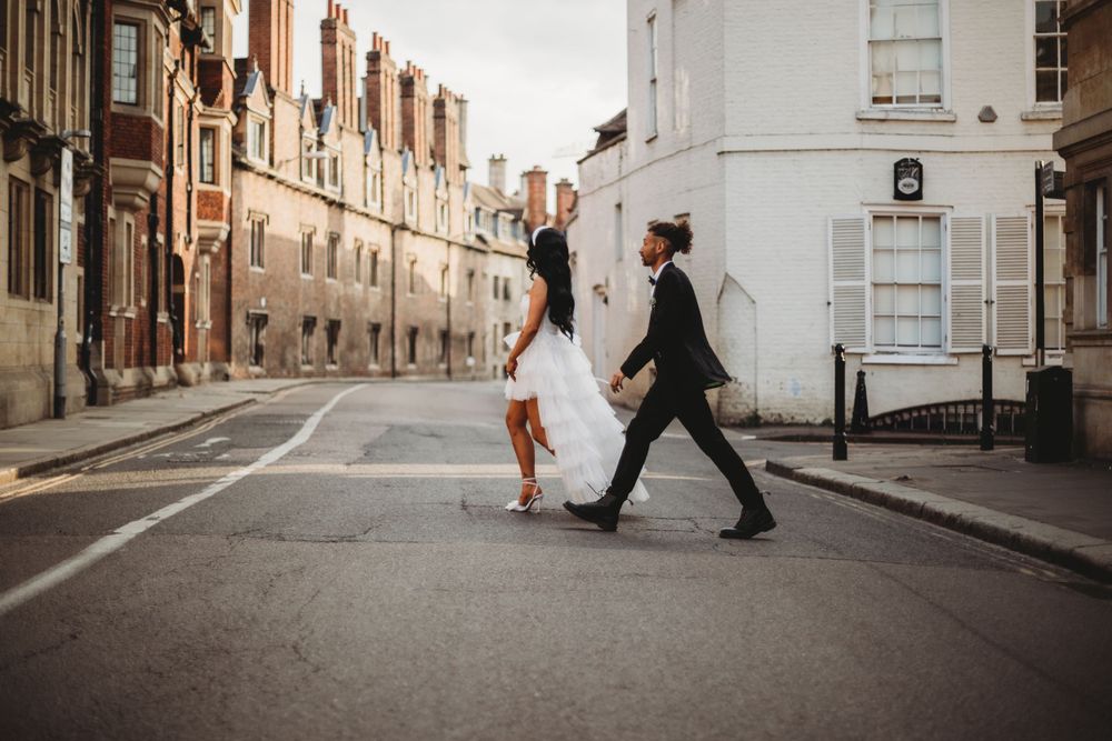 Cambridge wedding "walking across a road in Cambridge city"