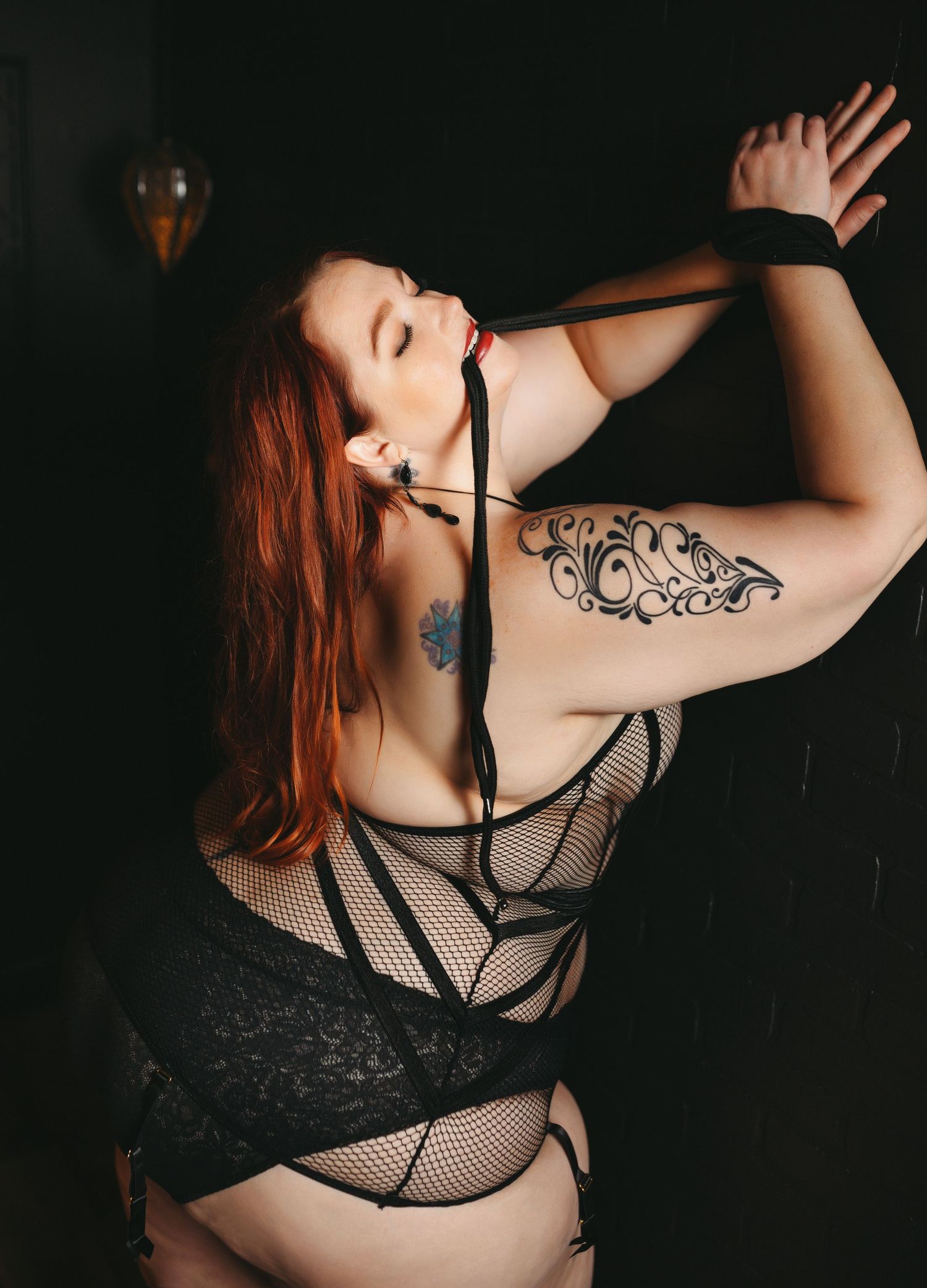 A sexy shot of lady biting whip. Greenville SC boudoir photographer, Easley SC boudoir photographer, Upstate boudoir photographer