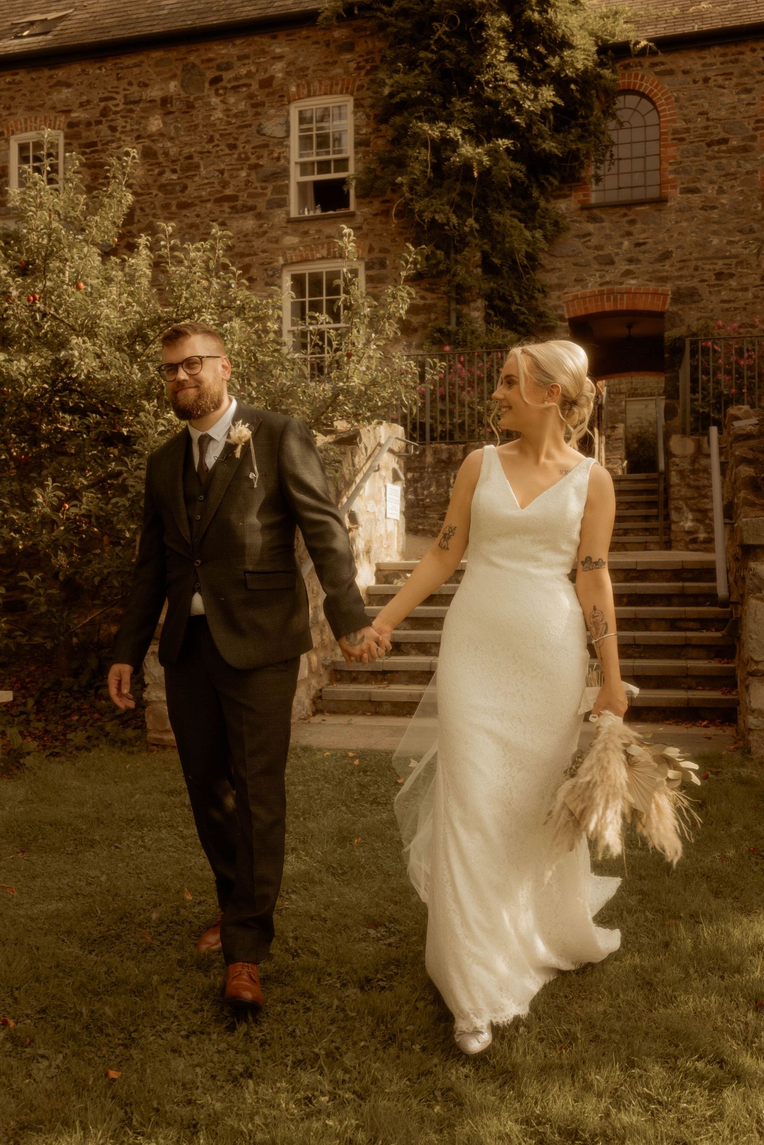 bride and groom outside wedding venue