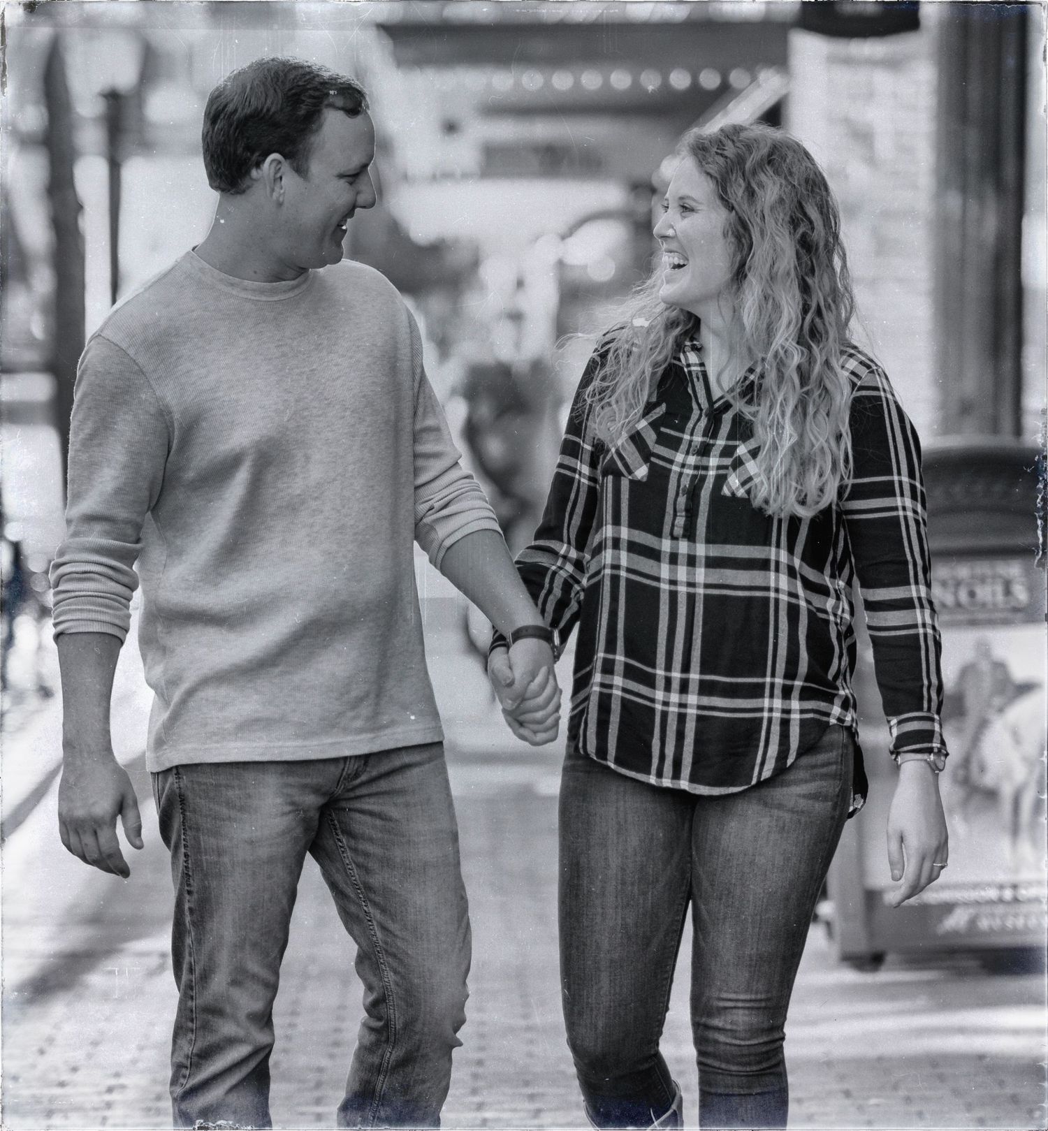 Couple walking for engagement photo in Ft Worth, Texas