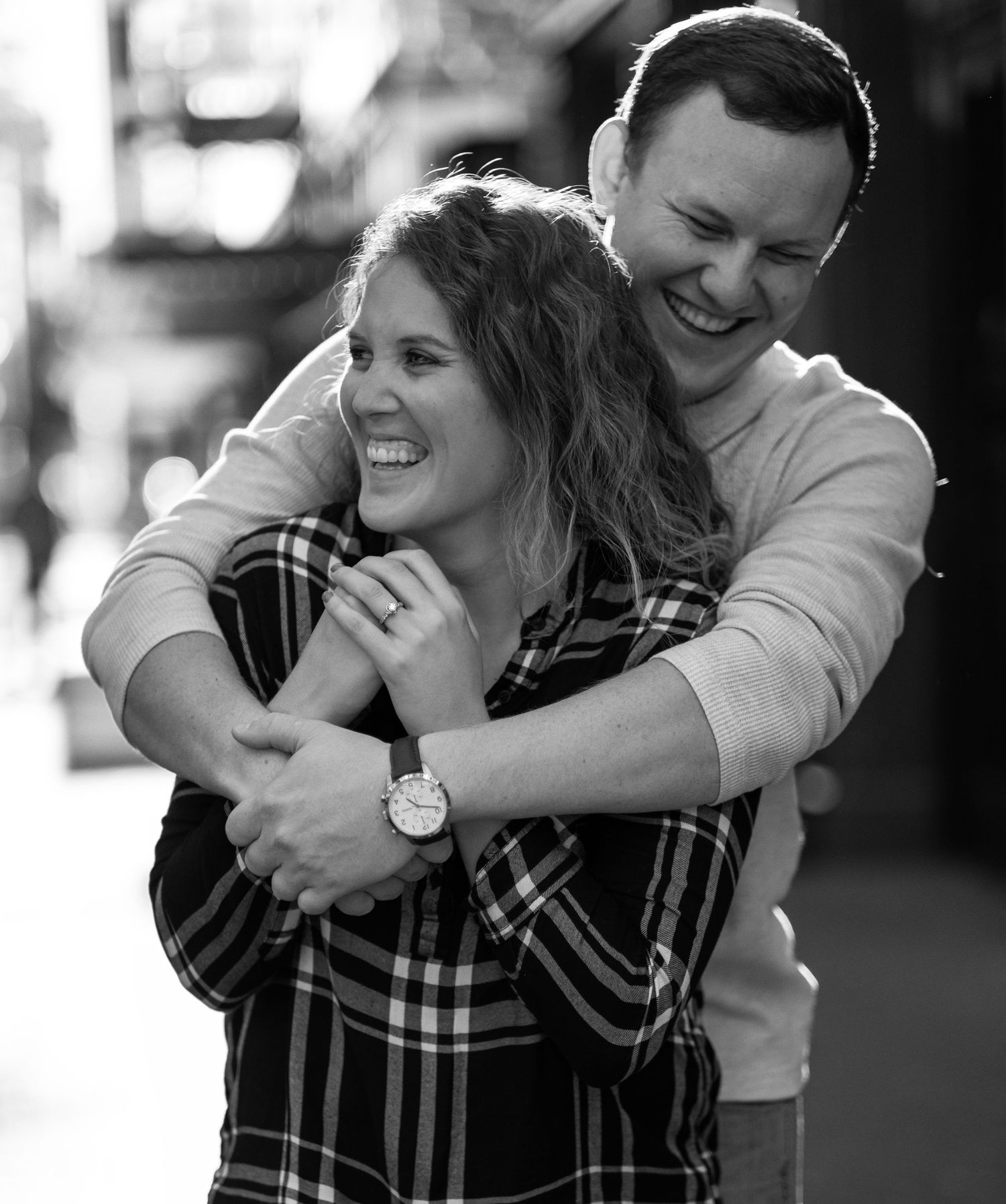 Couple hugging for engagement photo in Ft Worth, Texas