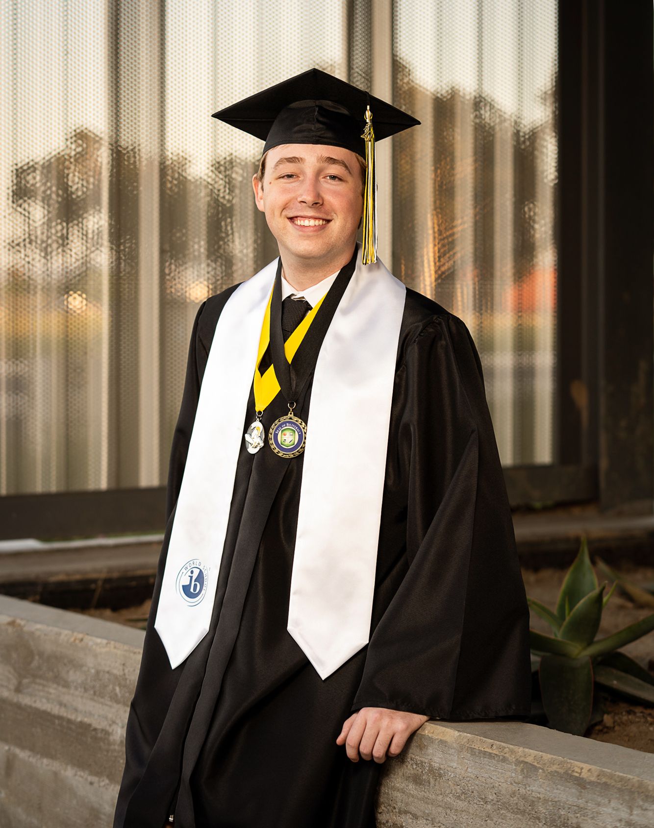 boy-graduating-high-school-in-cap-and-gown