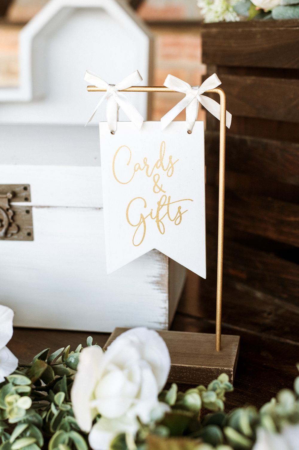 Elegant white and gold 'Cards & Gifts' wedding sign with floral accents.