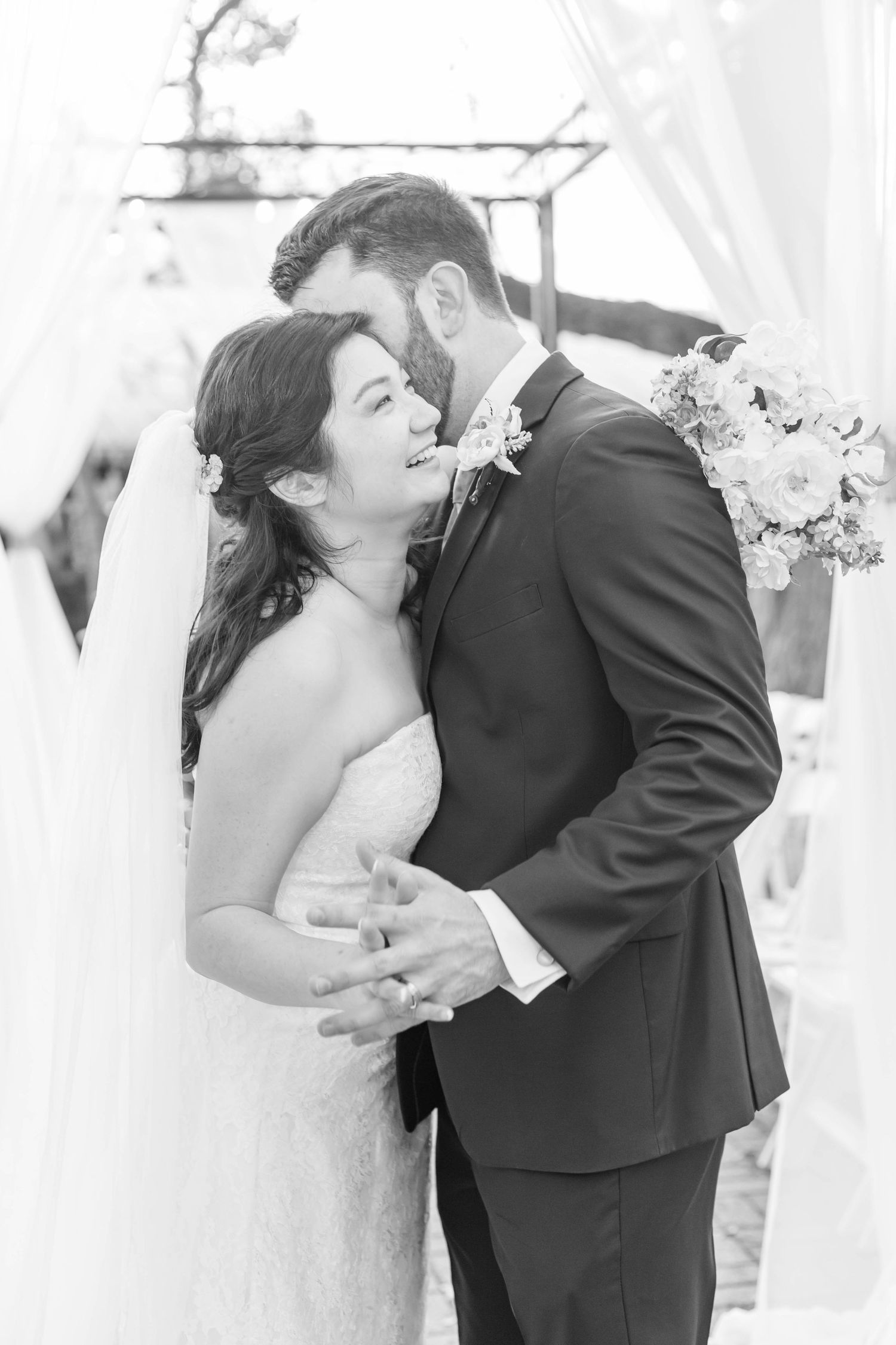 asian bride and caucasian groom from a baton rouge wedding planner