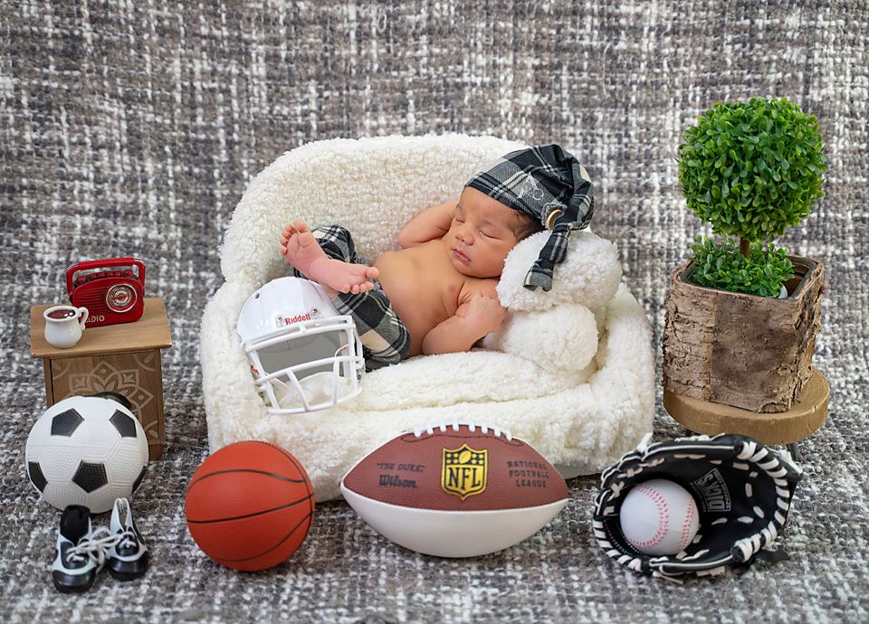 Newborn Baby on couch Newborn Photography Coral Springs Florida