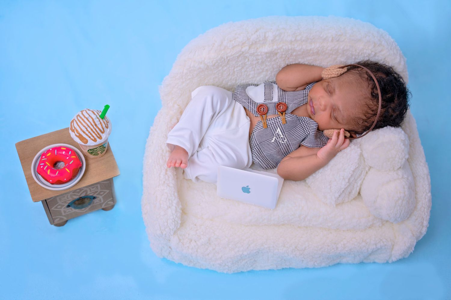 Newborn Baby Session Couch with Head Phones on Theme Newborn Photography Coral Springs Florida