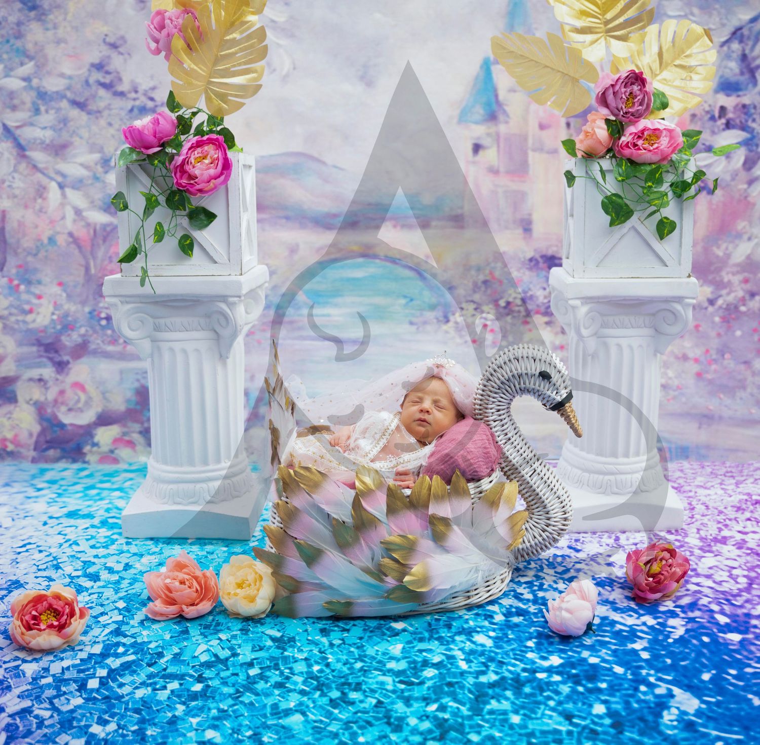 Elegant swan themed setup with white columns, roses, and sparkly blue floor.