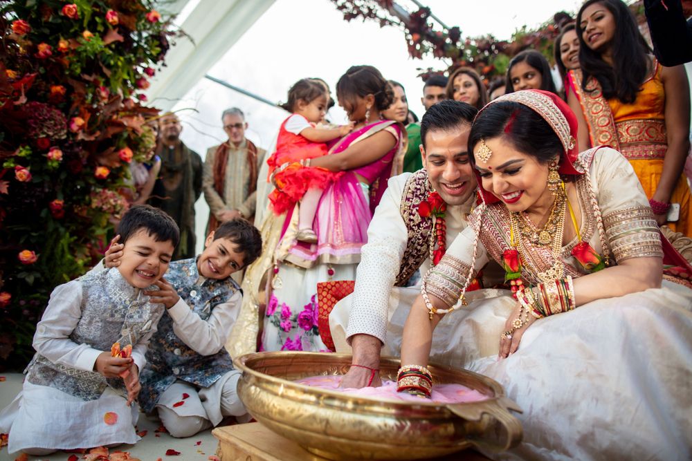 Traditional Indian wedding ceremony with guests participating in cultural rituals.