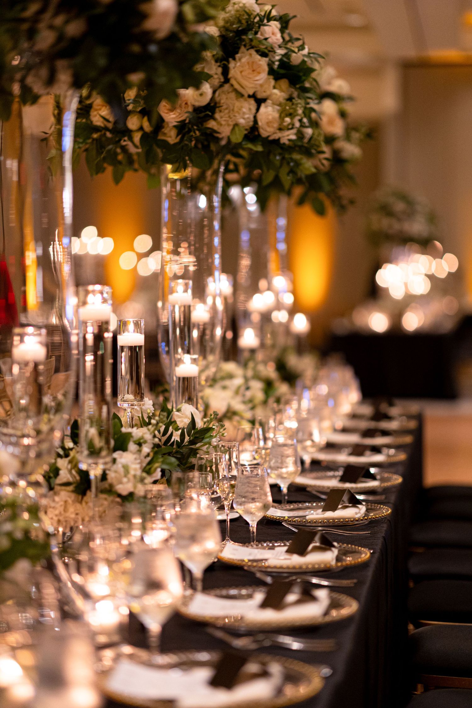 Romantic table settings with floral centerpieces, candlelight and fine dining details.