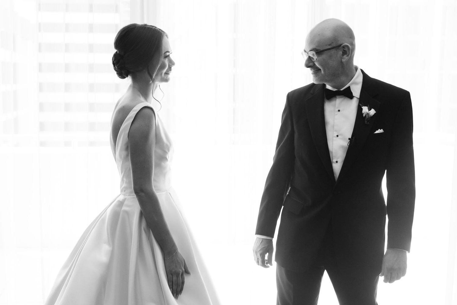 A series of intimate monochrome wedding moments captured in bright natural light.