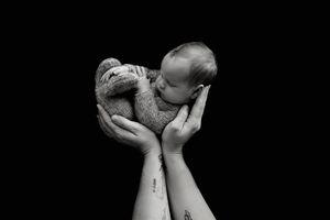 baby in hands detail