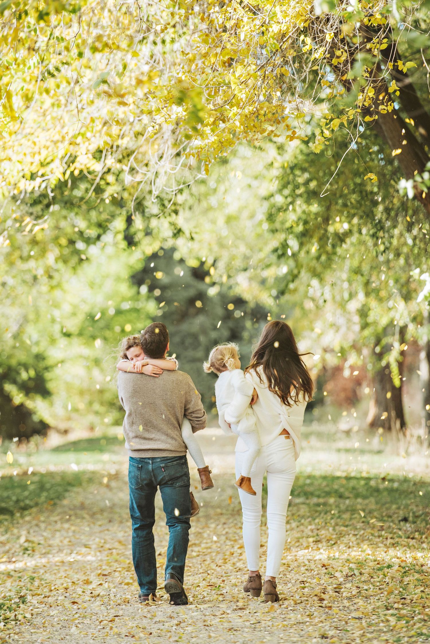 Boise family enjoys a walk in the falling leaves
