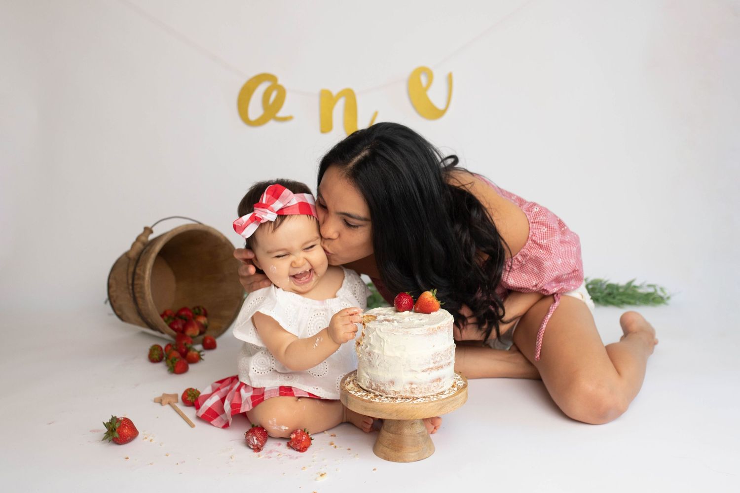 family photos with baby and cake in Huntersville NC