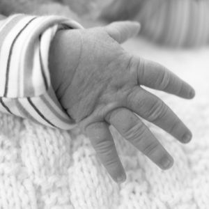 newborn baby photo photographyhand close up soomed in black and white black & white