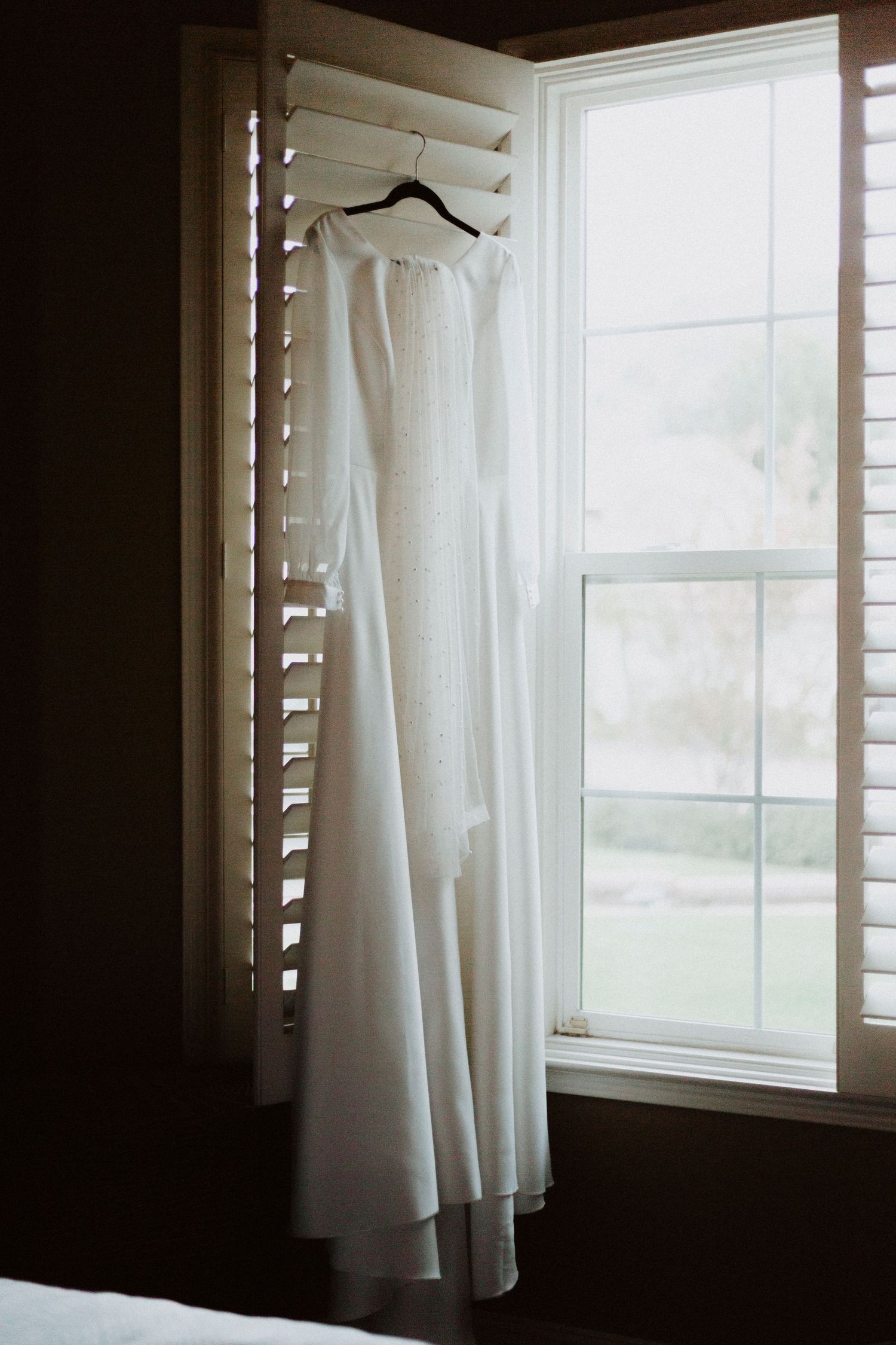 detail shot of wedding dress in California wedding
