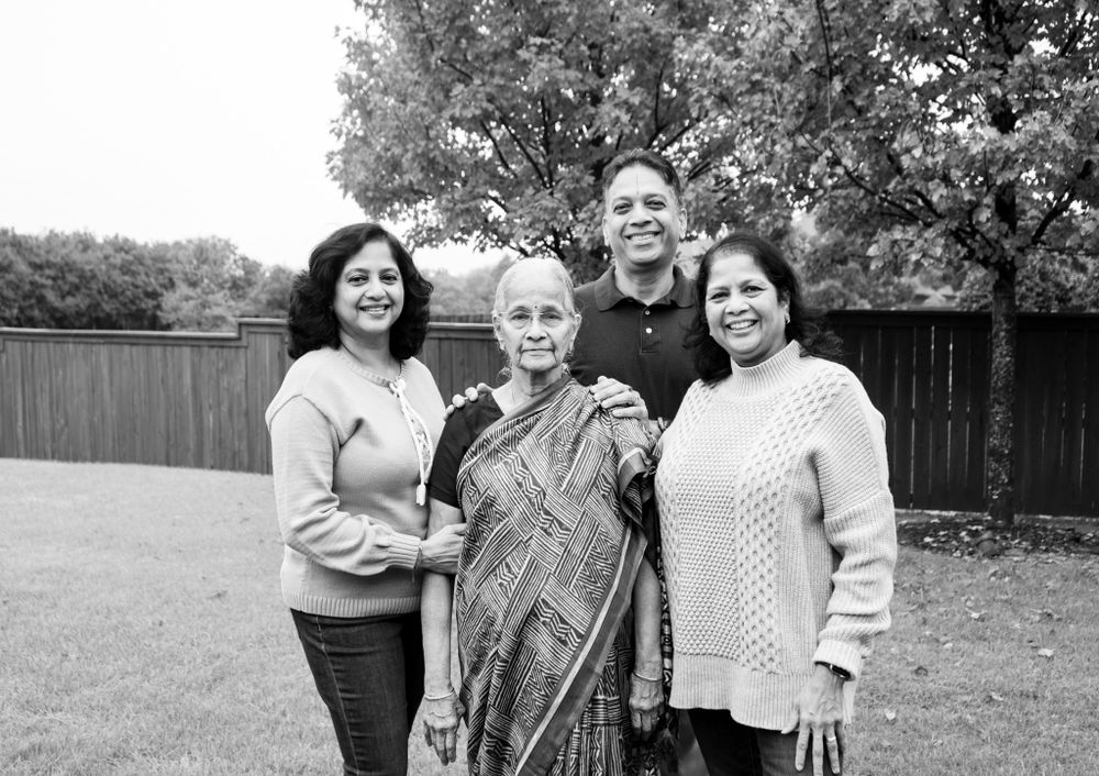 A collection of casual family portraits taken in an outdoor setting.