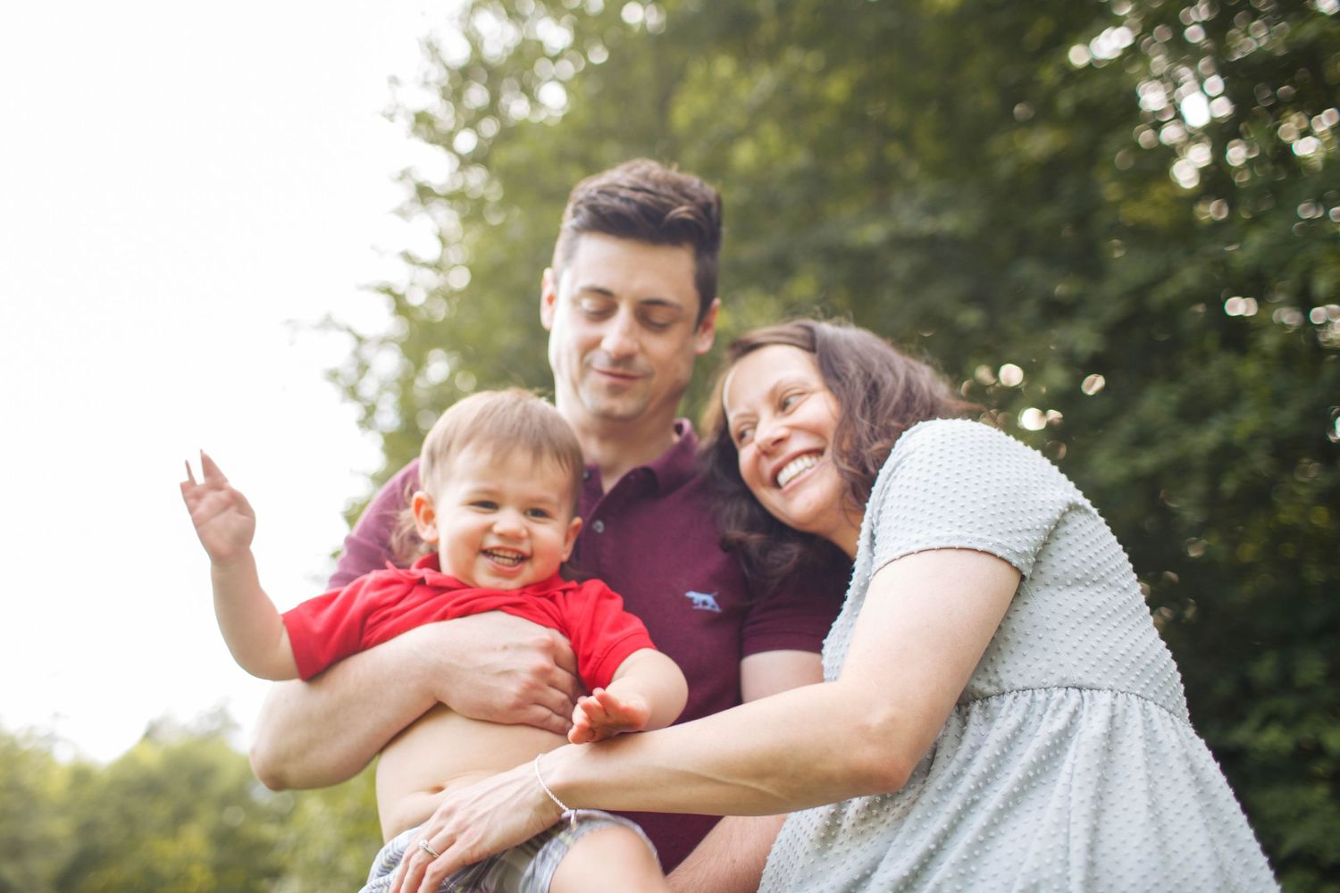 Everett maternity photo session: A mother, father and toddler at their maternity photo session at Wills D. Tucker park