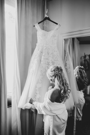 Bride and dress pose