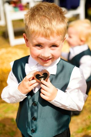 Kids at wedding, wedding ring, wedding photography.