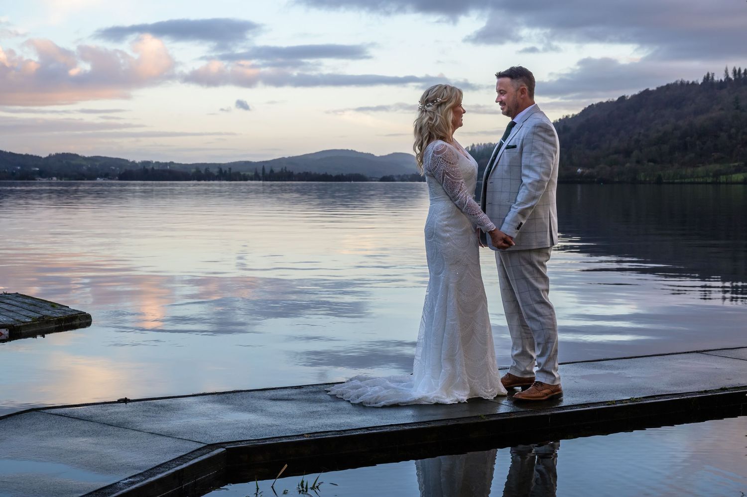 Bride and groom on jetty at Cragwood Country House