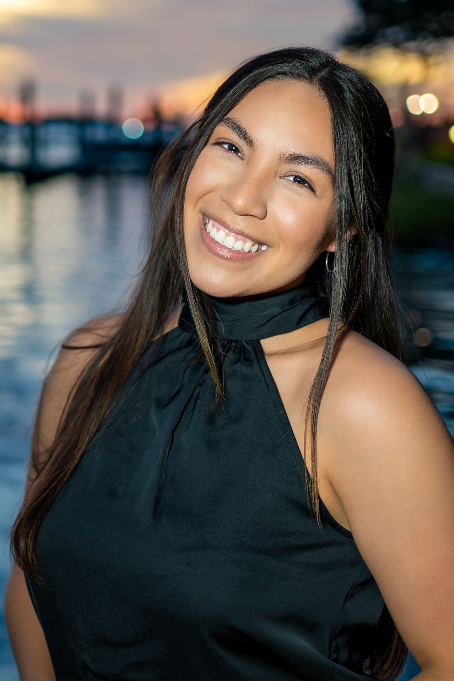 Professional headshot portrait of Sierra Lopez, photographer, videographer, and video editor at Sierra Lopez Productions.