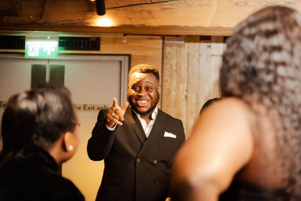 A joyful moment captured at an indoor celebration.