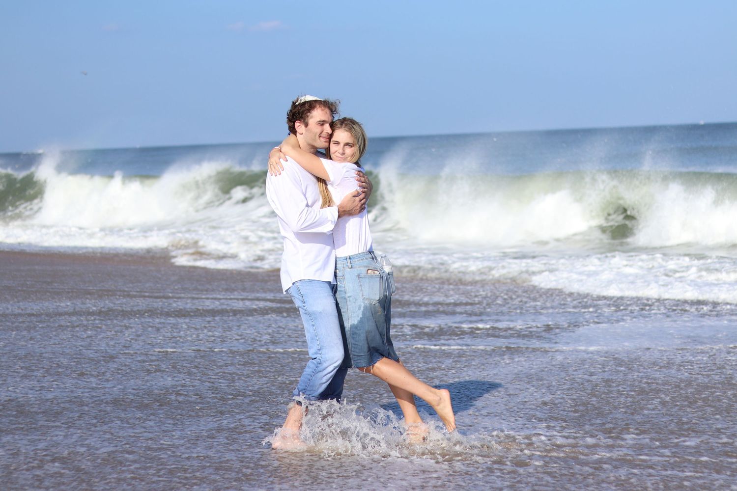 Couple posed cutely by a fantastic New Jersey photographer at the Ocean Grove beach.