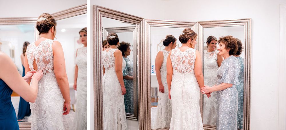 Back view of lace wedding dress details being admired in three-panel mirror.