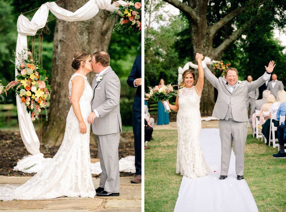 A romantic wedding ceremony under a white draped arch decorated with yellow flowers in an outdoor garden setting.