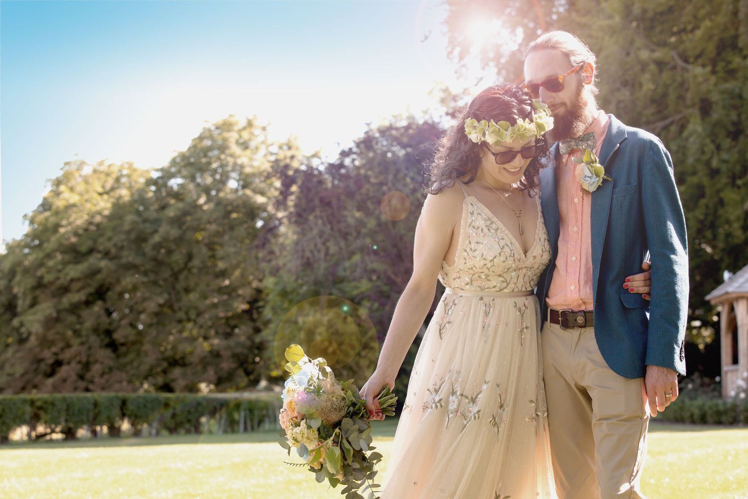Bride and Groom dressed in wedding attire, just married at The Ridgeway Barns in Liddington, near Swindon
