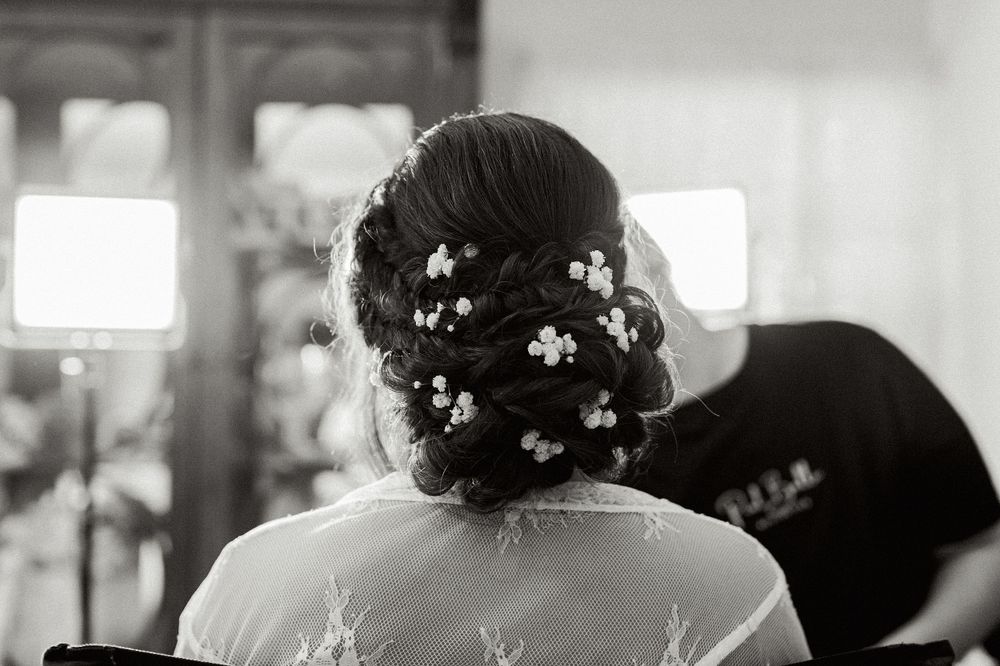 Black and white photo showing delicate floral hair accessories.