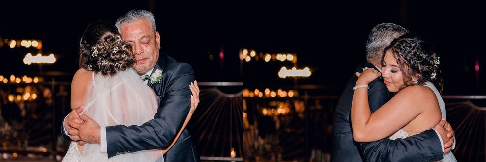Emotional moments captured during an evening wedding celebration on an outdoor terrace.