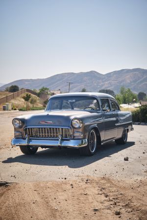 Classic 1955 Chevrolet Bel Air sedan photographed in a desert setting.