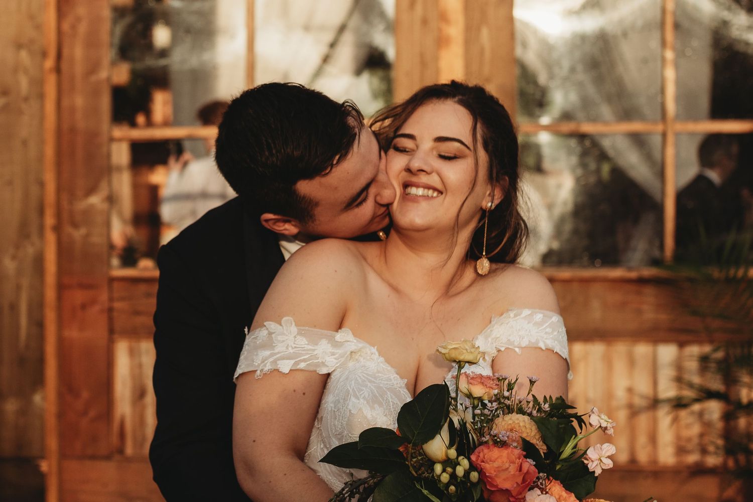 Bride and groom romantic portrait during golden hour at le Pont couvert wedding venue