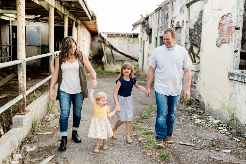 family plays amongst crumbling buildings rustic photo locations pacific northwest photographer