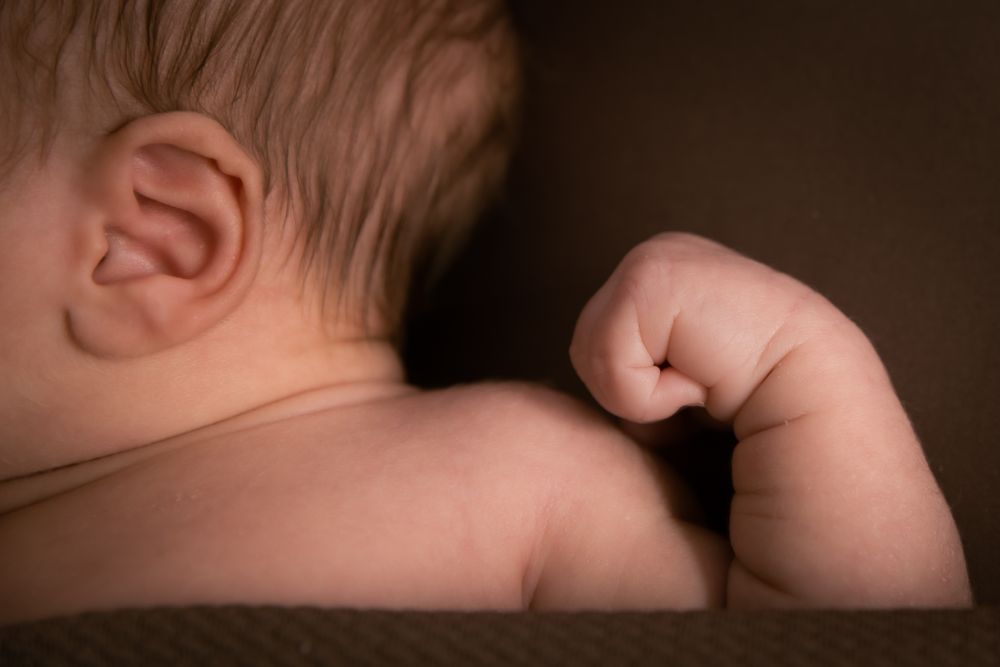 baby hand and ear