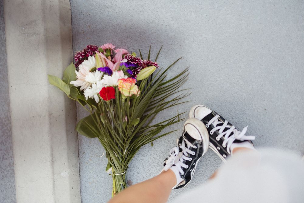 Delicate floral arrangements with colorful blooms displayed against a light background.
