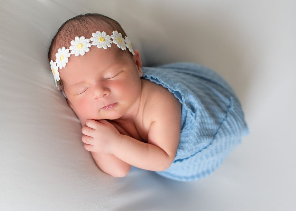 angel baby, daisies, sleeping newborn, blue, white