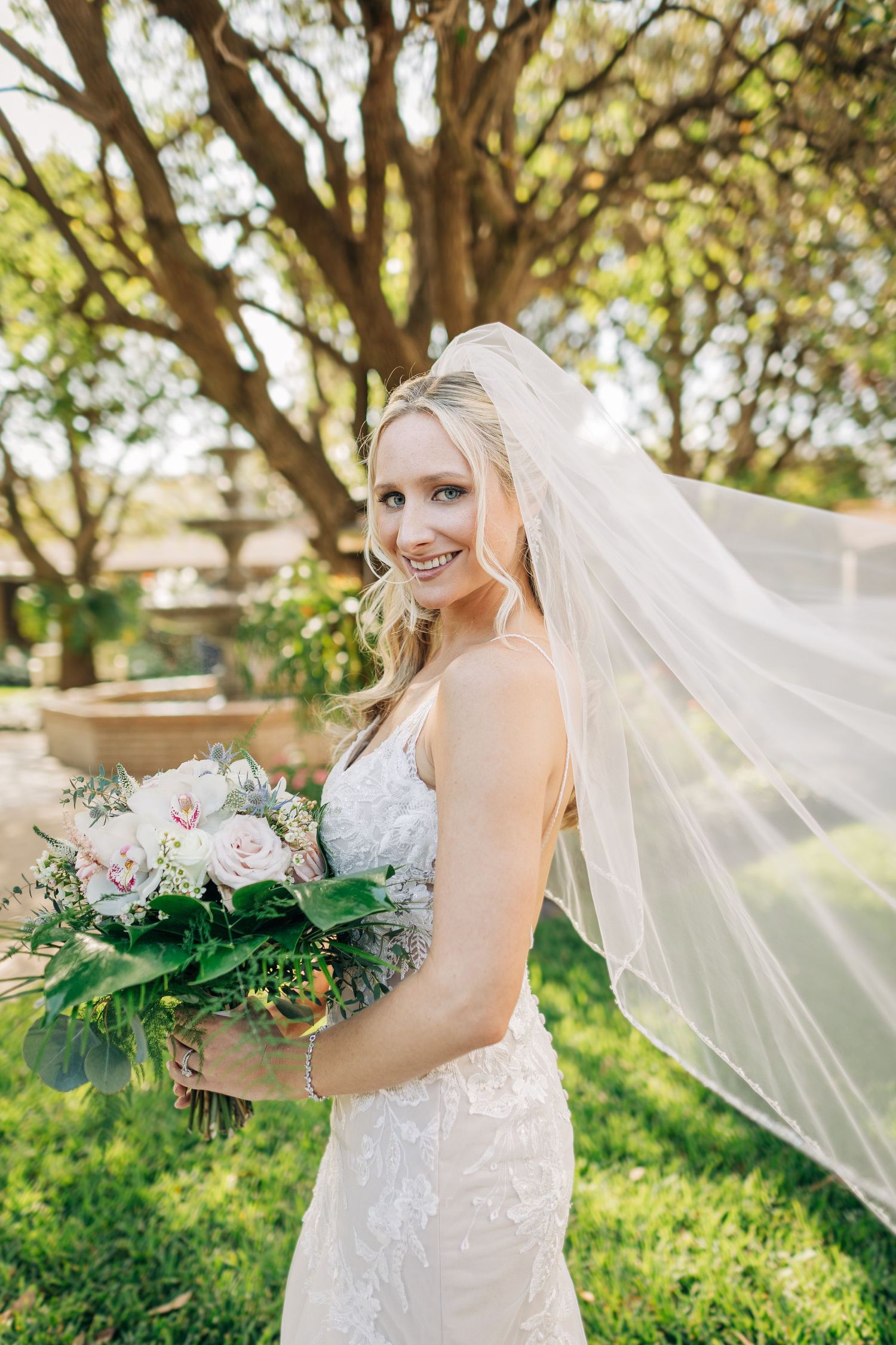 Bride during her bridal portraits at Saint Mary's Catholic Church taken by Sarasota wedding photographer.