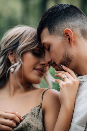 Tucson couples portrait capturing a close, intimate moment with soft natural light and warm tones.