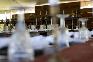 Artistic shallow depth of field shot of laboratory glassware in vintage setting.