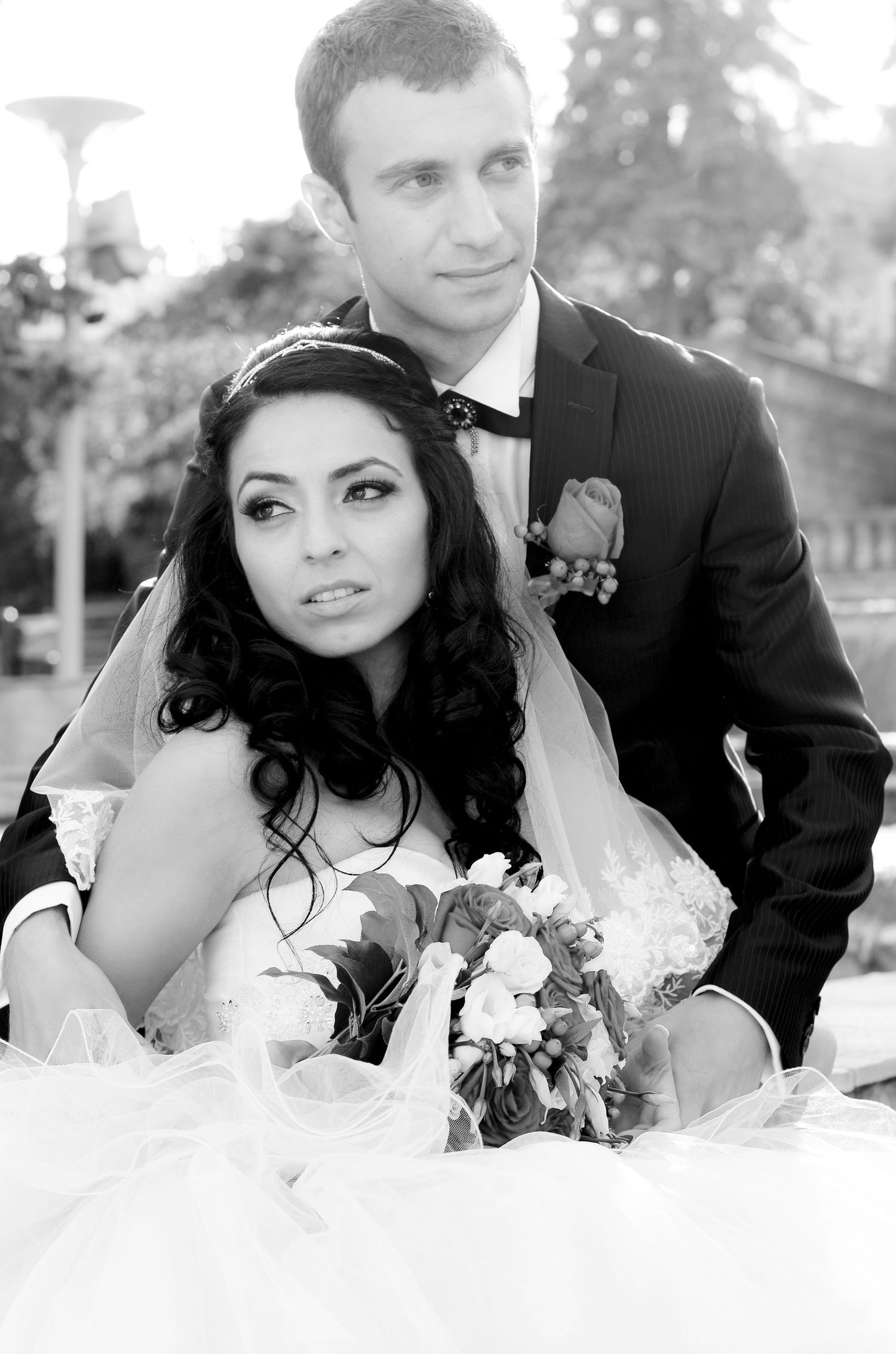 Classic black and white wedding portrait featuring elegant bridal styling.