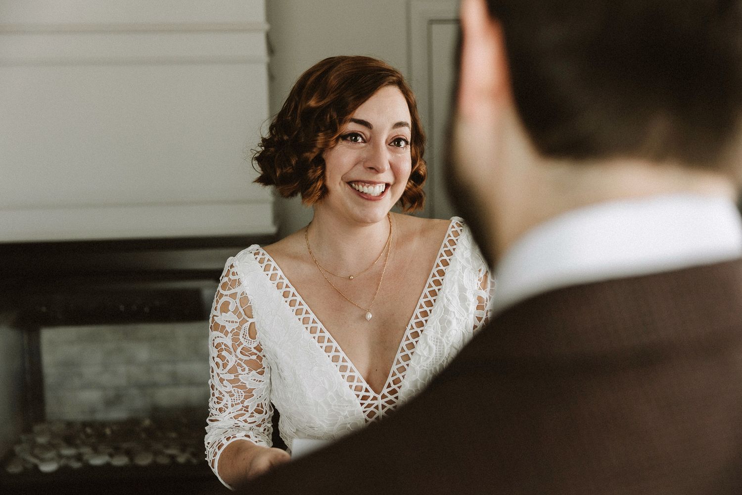 An intimate wedding portrait showing genuine joy and emotion.