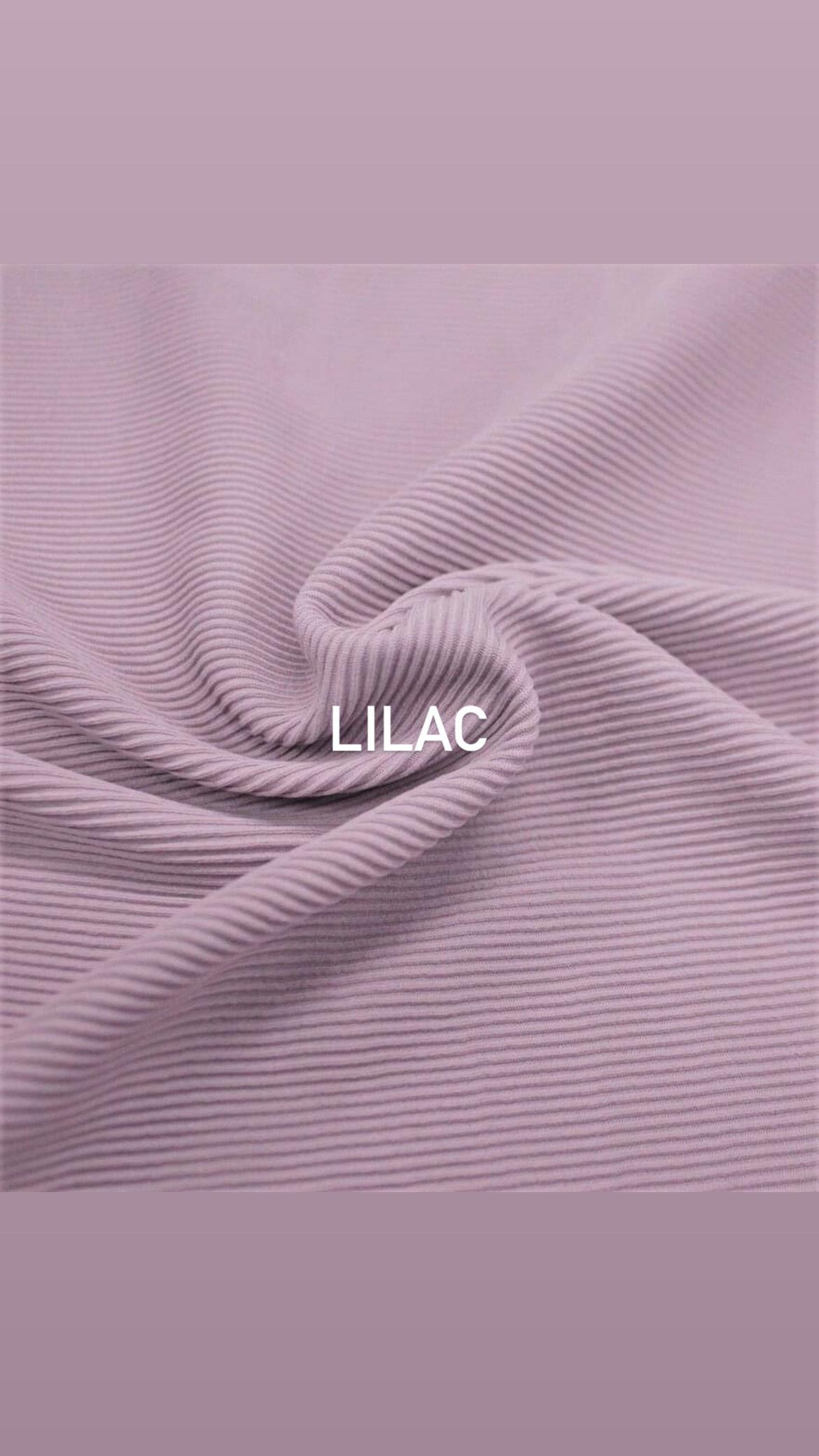 Lilac colored ribbed fabric swirled in a spiral pattern with text overlay.