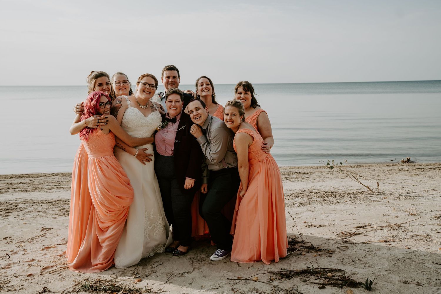 bride and bride with wedding party at Wasaga Beach