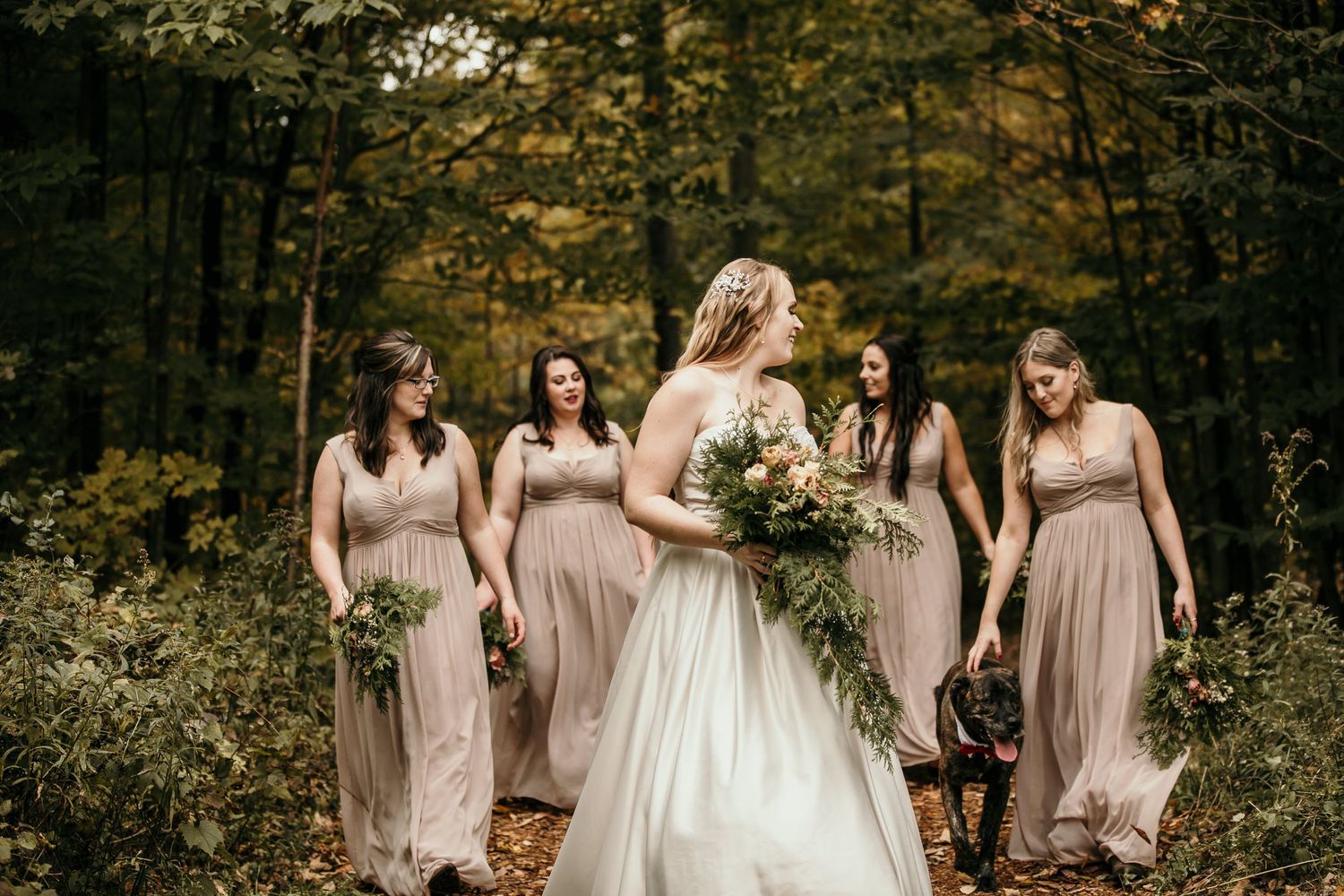 bride looking back at her bridesmaids