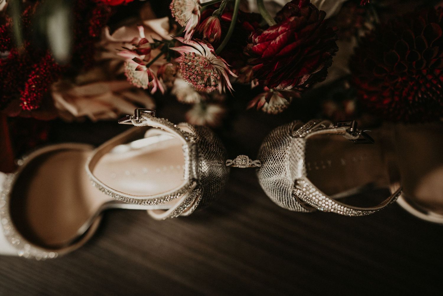 bridal shoes with ring between the two heels